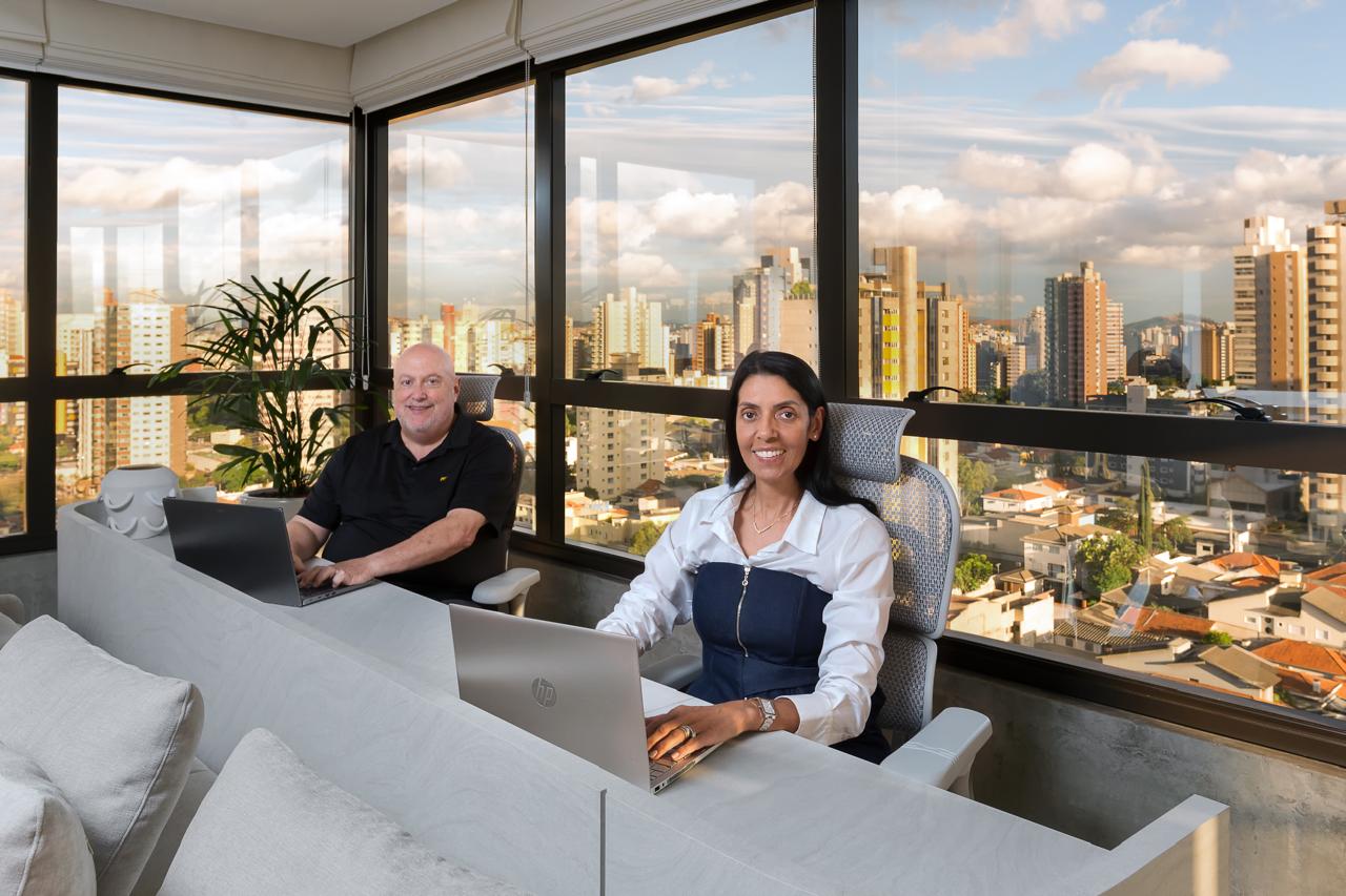 Jeff and Laura at desk